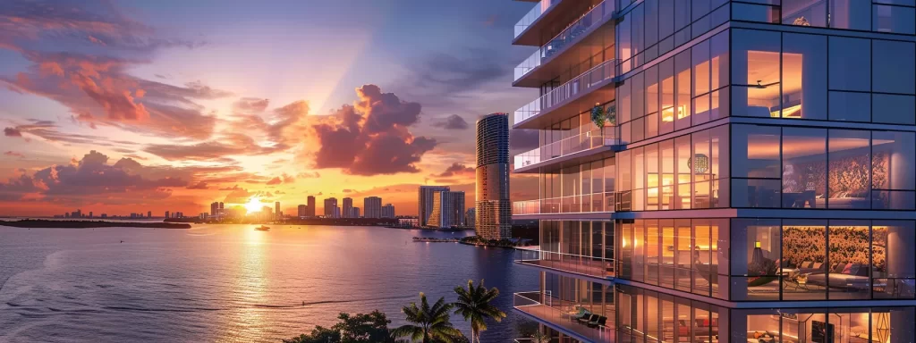 a breathtaking sunset casts a warm glow over luxurious waterfront condos in miami, highlighting the stunning views of the shimmering ocean and vibrant skyline.