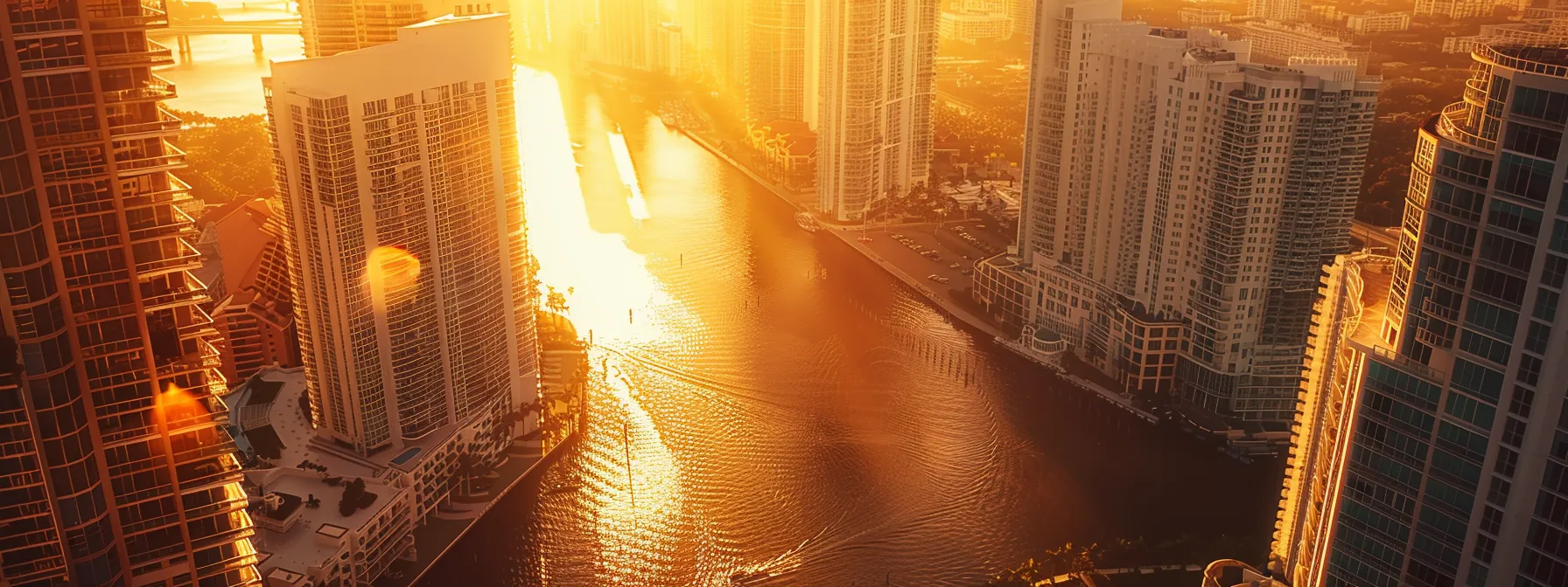 eine atemberaubende Luftaufnahme des modernen miami Eigentumswohnungen, die in goldenes Sonnenlicht getaucht sind und die pulsierende Energie und den luxuriösen Lebensstil widerspiegeln, den potenzielle Käufer bei ihren Finanzierungsoptionen suchen.