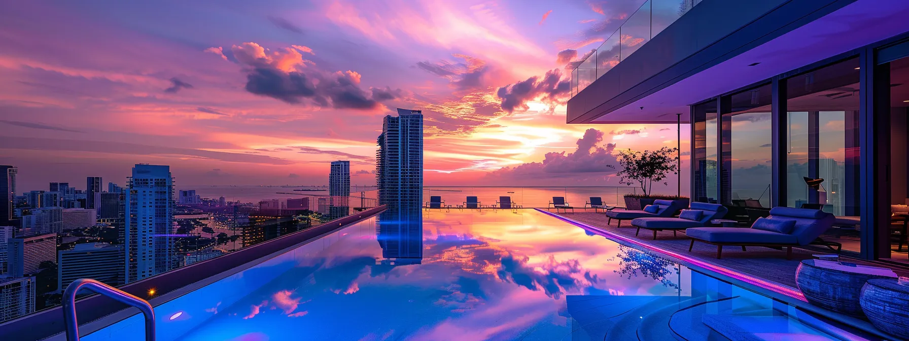 a stunning rooftop view of a luxurious miami condo, showcasing elegant poolside amenities under a vibrant sunset, with the skyline in the background.