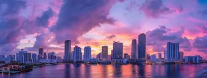 a vibrant miami skyline at sunset serves as a backdrop for a diverse group of first-time homebuyers, their expressions reflecting a mix of hope and determination as they navigate the complexities of the housing market.